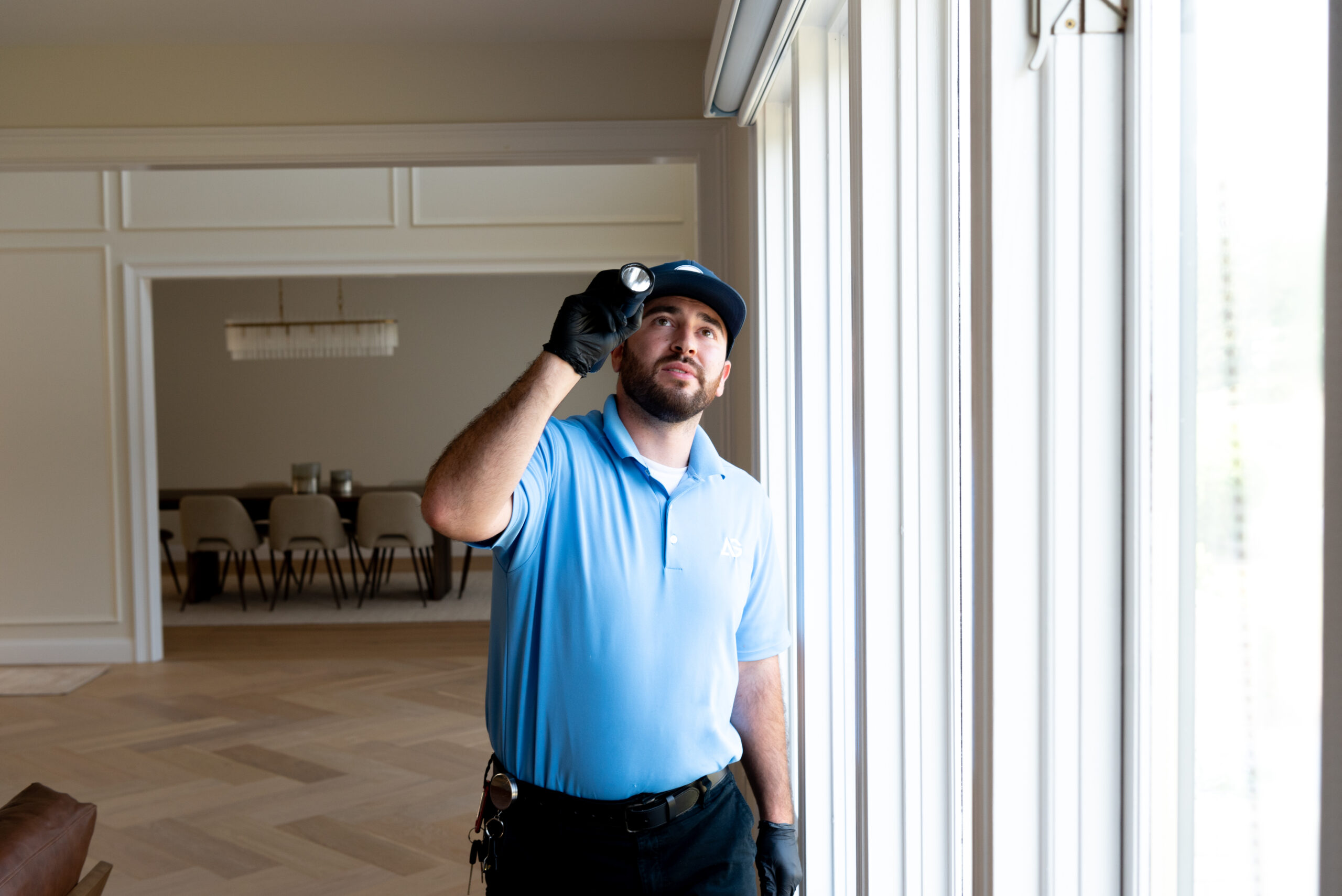 Agile Pest Control technician performing a bed bug treatment at a home in Oceanport, NJ, carefully applying targeted treatments to affected areas to ensure thorough elimination.