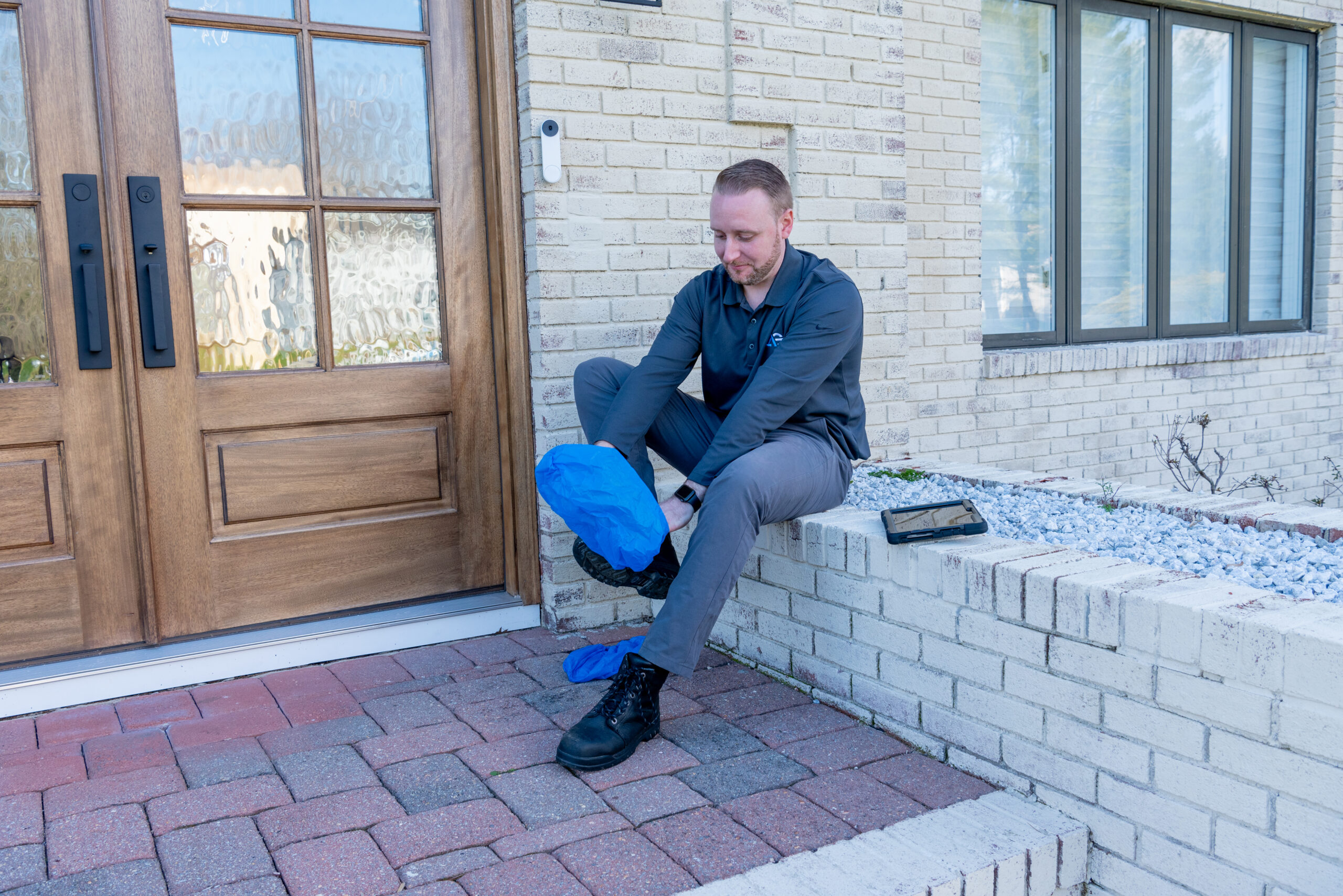 Agile Pest Control technician servicing a home in Tinton Falls, NJ, performing a detailed bed bug control treatment to eliminate the infestation and protect the property.