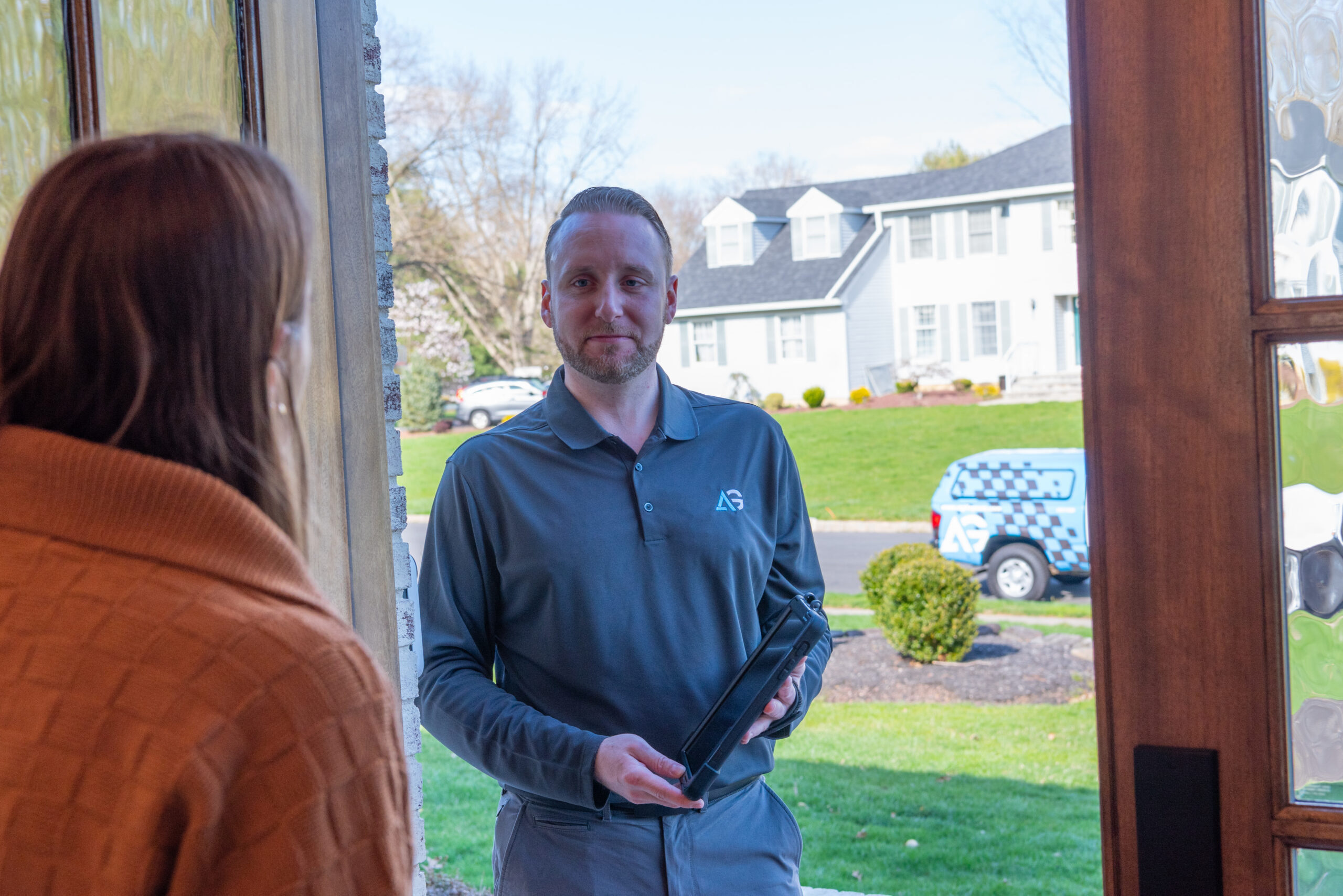 Agile Pest Control technician arriving at a home in Shrewsbury, NJ, equipped to perform a professional bed bug control service, ensuring thorough inspection and treatment.