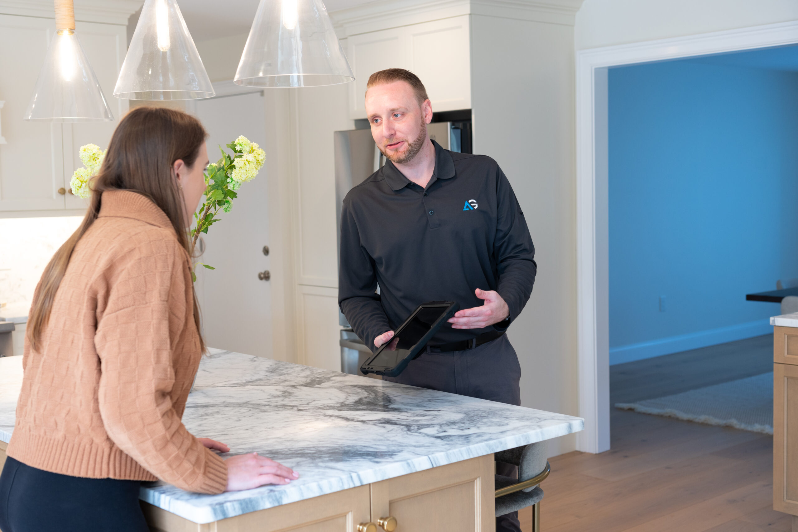 Agile Pest Control technician conducting a detailed bed bug inspection at a home in Red Bank, NJ, carefully examining furniture and bedding for signs of infestation.