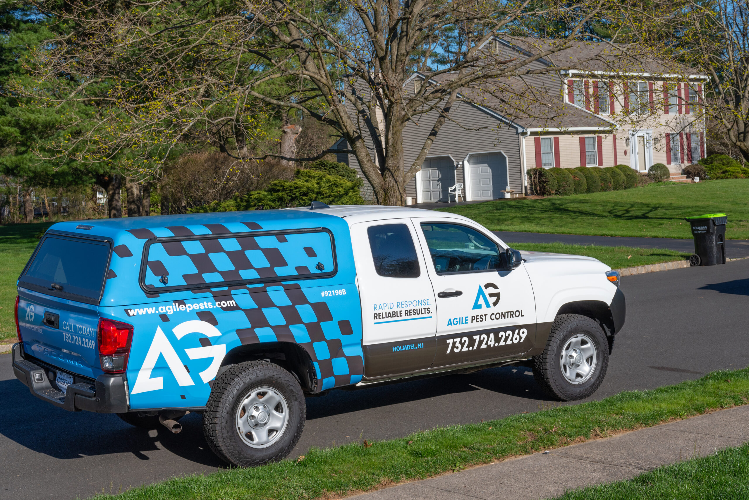 Agile Pest Control technician performing an inspection for cockroach control at a Monmouth County, NJ property.