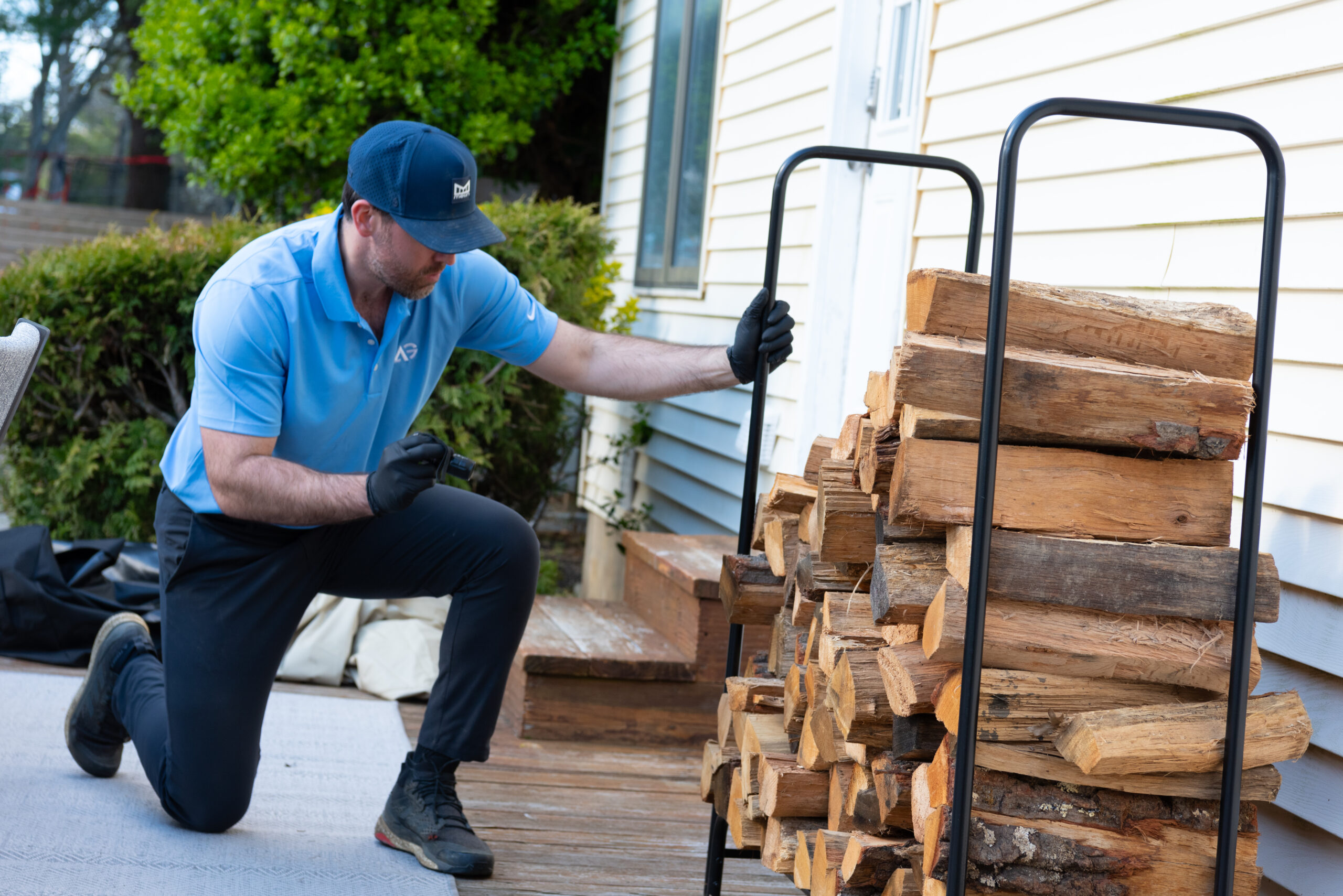 Agile Pest Control technician performing an inspection for mice removal in a Monmouth County, NJ home.