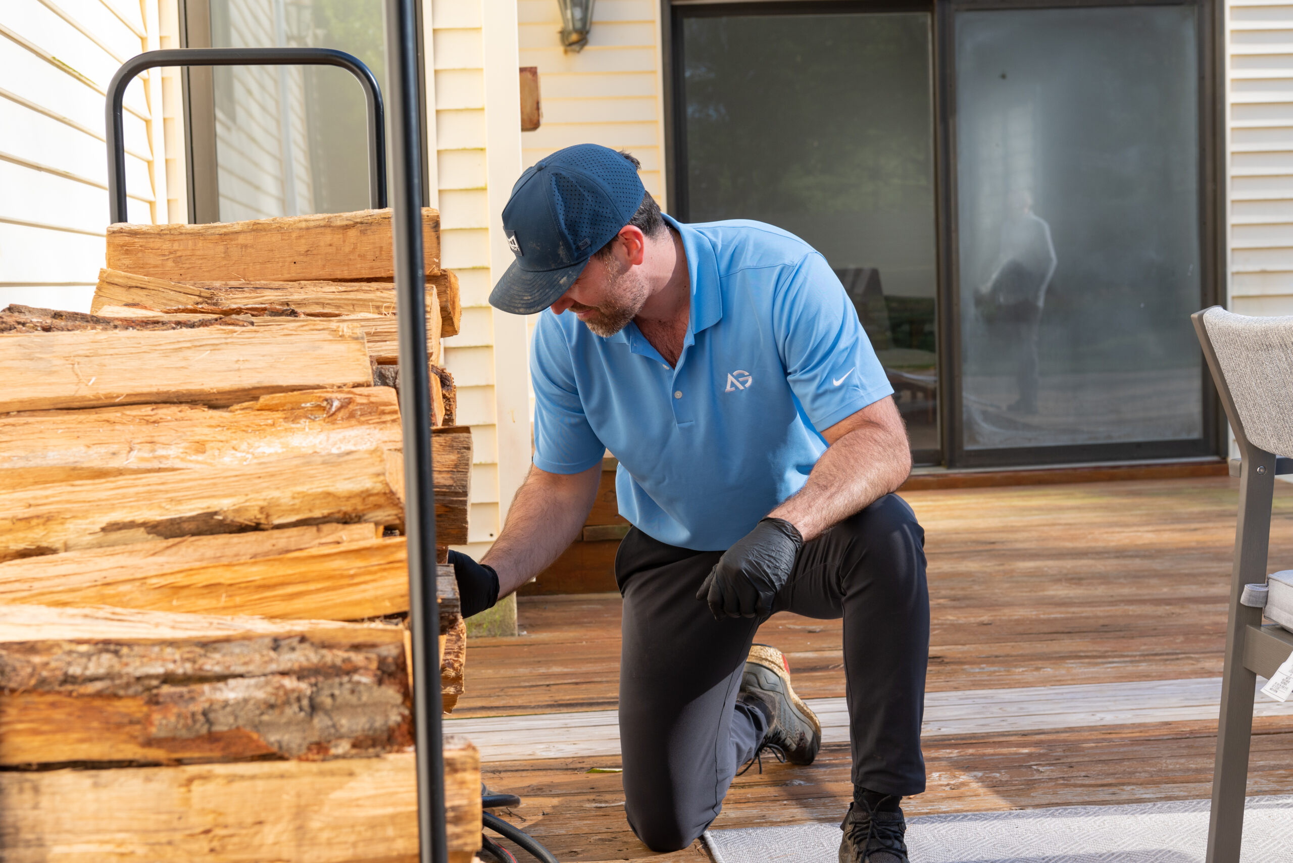 Agile Pest Control technician performing an inspection for rat control in a Monmouth County, NJ property.