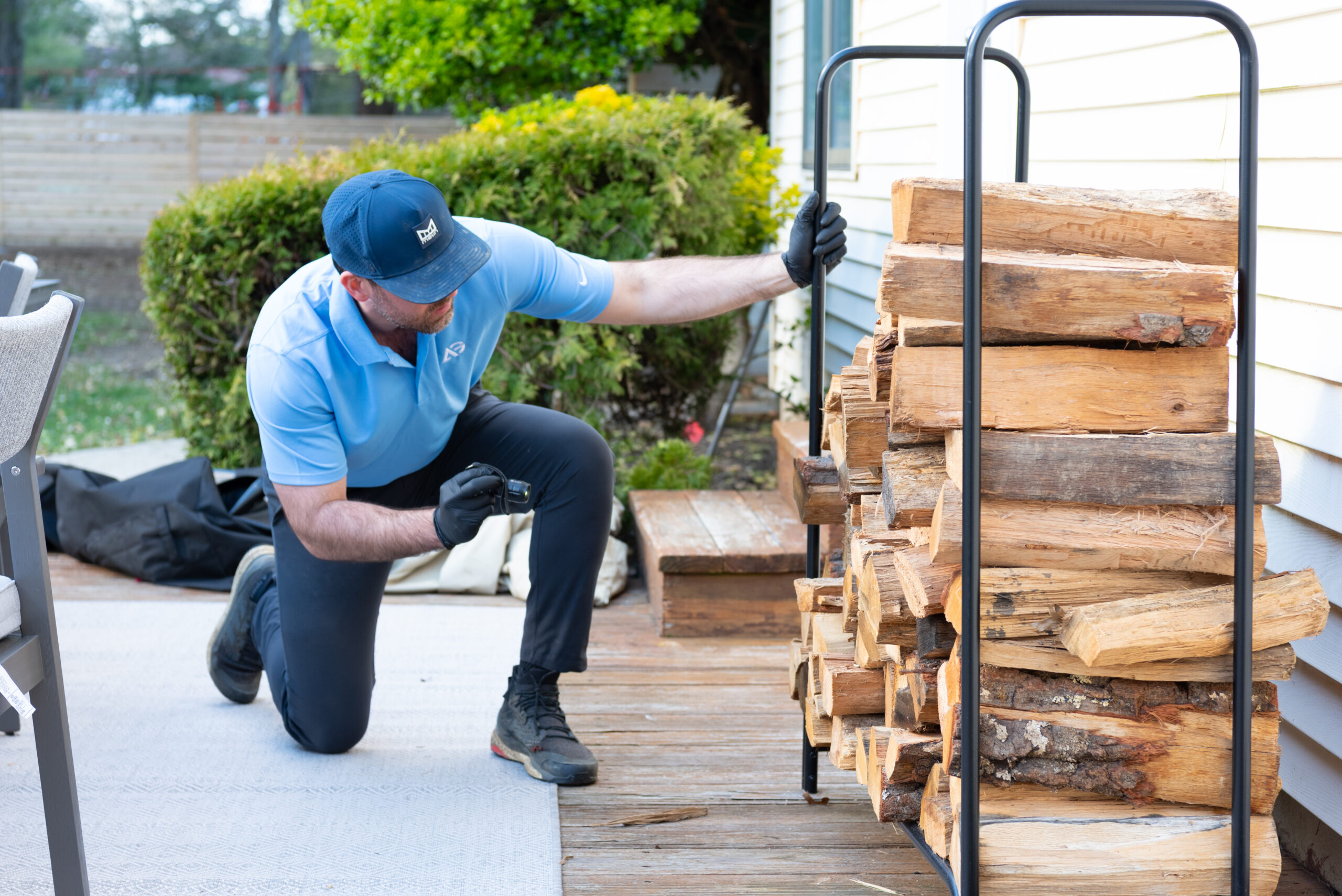 Agile Pest Control technician performing an inspection for rat extermination in a Monmouth County, NJ property.