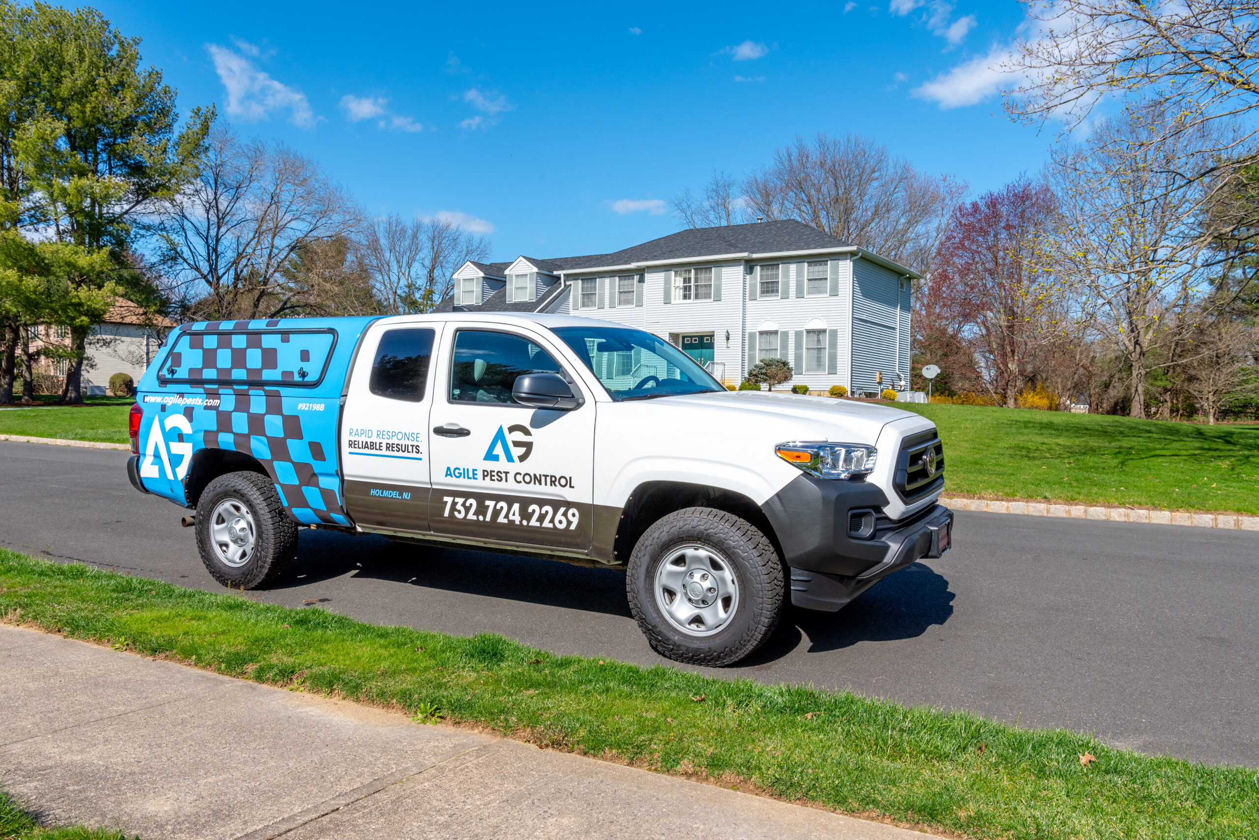 Agile Pest Control technician performing an inspection for wildlife removal at a Monmouth County, NJ property.