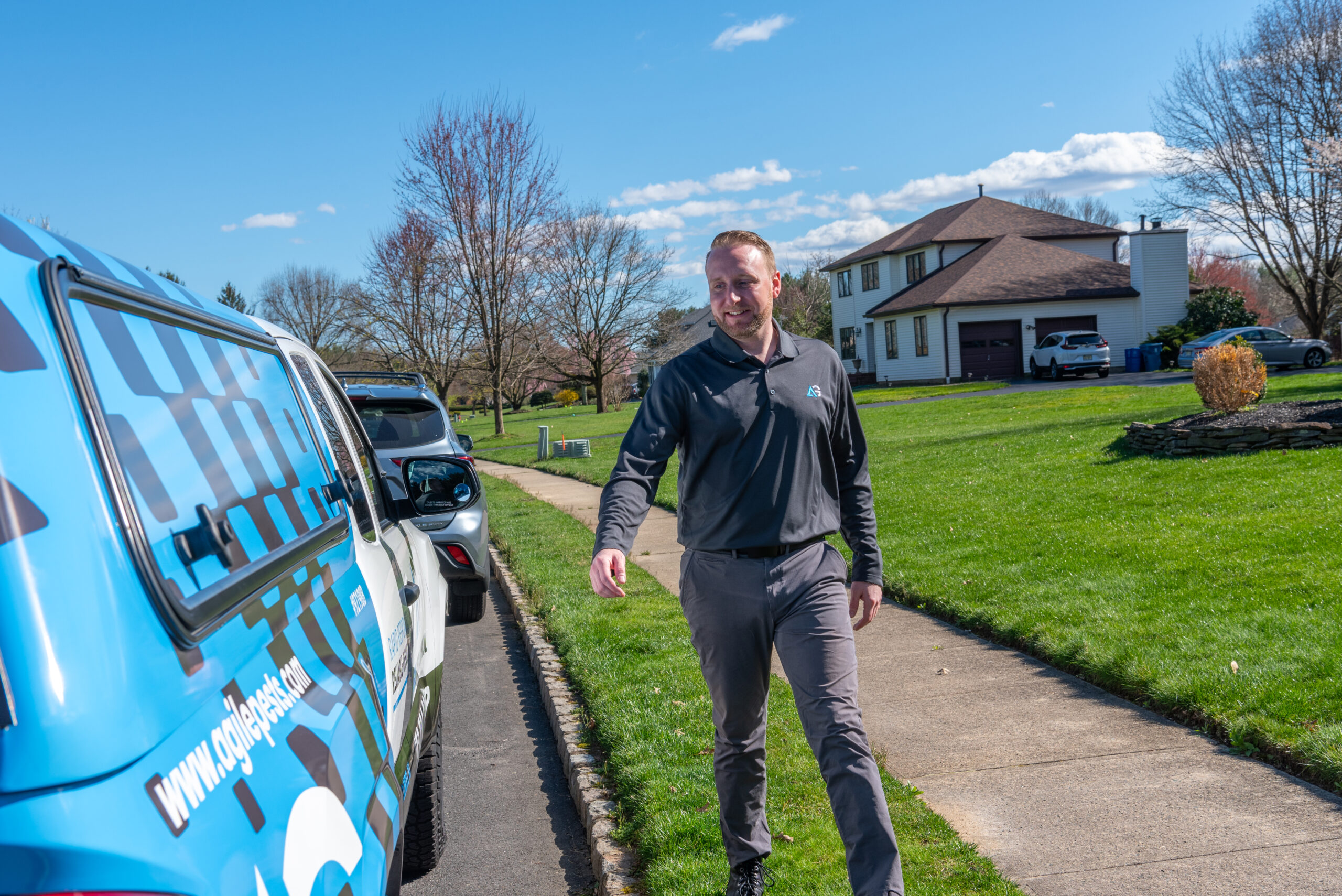 Agile Pest Control technician arriving at a Monmouth County home to investigate scratching noises in the walls caused by potential rodent activity