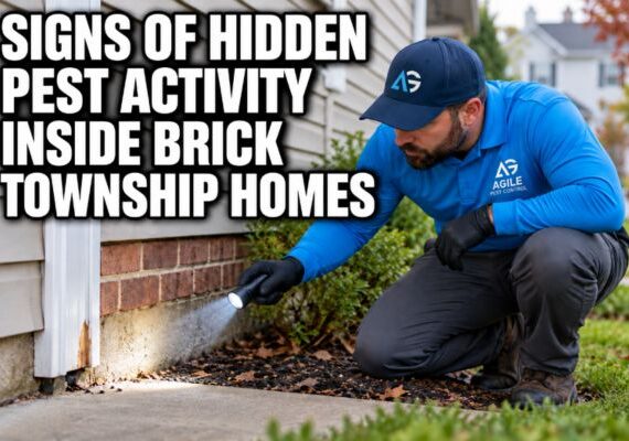Agile Pest Control technician inspecting the foundation of a Brick Township home for signs of hidden pest activity